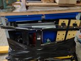 une photo d'un établi sur lequel sont posés de nombreux outils
