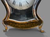 a clock that is sitting on top of a table