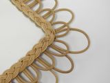 a picture of a mirror that has a rope around it