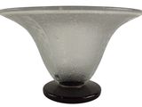 a glass vase with a black base on a white background