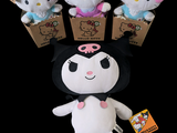 five hello kitty plush toys sitting on top of each other