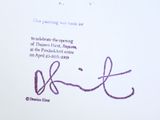 a purple ink drawing of a person on a sheet of paper