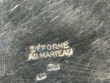 an image of a close up of a metal object with a label on it