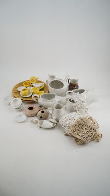 a white table with a lot of different items on it