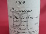 a bottle of wine that is sitting on a table