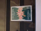 a stamp with a design on it sitting on a window sill