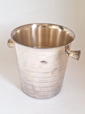 a silver bucket with a handle on a white background