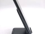 a cell phone that is sitting on top of a stand