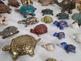 many different kinds of figurines on a table