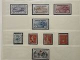 framed picture of a collection of stamps and stamps from different countries