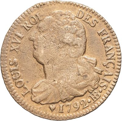 a close up of a coin on a white background