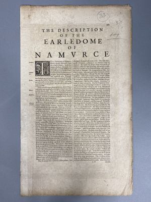 an old book with a black and white image on it