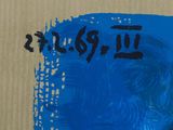 a picture of a painting of a woman on a cardboard box