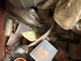 a picture of a pile of trash in a trash can