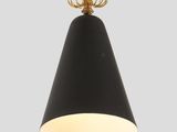 a black and gold pendant light hanging from the ceiling