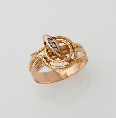 an image of a gold ring with a snake on top of it
