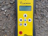 an image of a yellow and black electronic device laying on the ground