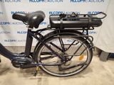 a bicycle with a basket on the back of it