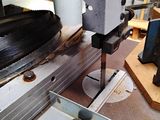 an image of a machine that is working on a piece of wood