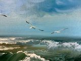 painting of seagulls flying over a wave in the ocean