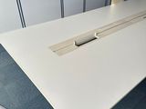 an image of a white table in a room