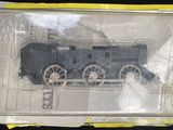 a plastic box with a toy train inside of it