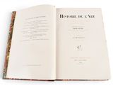 an open book with a picture of a cat on it