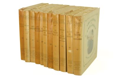six books in a row sitting on top of each other on a white surface