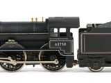 a toy train that is sitting on a white surface