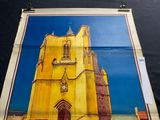 a picture of a painting of a church on the wall