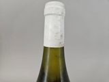 a bottle of wine that is sitting on a table