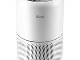 un purificateur d'air blanc posé sur une table blanche
