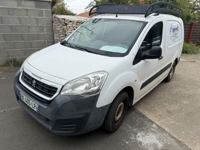 a white van that is parked on the side of the road
