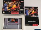 an image of two video game cartridges sitting on top of a table