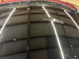 a close up of a car ' s roof with a sticker on it
