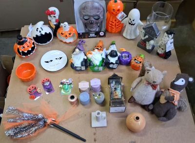 a table with a lot of halloween decorations on it