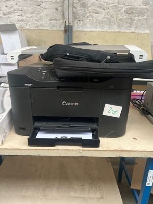 a printer that is sitting on top of a table