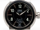 an image of a close up of a wrist watch on a white surface