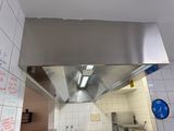 a view of a kitchen from the inside of a kitchen
