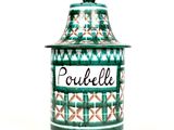 a green and white jar with a name on it