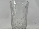 the glass is empty on the table and is ready to be used