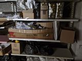 many boxes and boxes on the shelves in the room