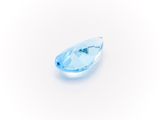a close up of a blue topazte stone on a white background