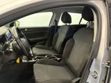 the interior of a car with the front seats folded down