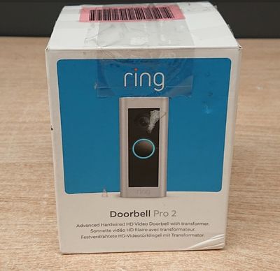 a box with a door bell on it sitting on a table