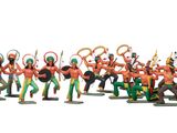 de nombreuses figurines de différentes couleurs et tailles disposées sur une surface blanche