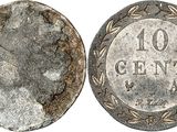 a close up of a coin with a face on it