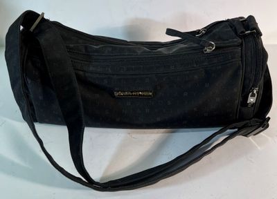 an image of a black handbag with a strap on it