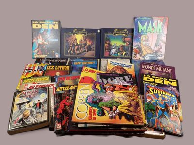a lot of comic books sitting on a table