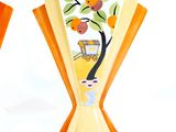 two vases that have been painted with oranges on them